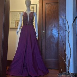 Mori lee Gardner size 4 beautiful, purple beaded gowned. Never worn. Zip up